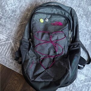 The North Face Charcoal Backpack with Magenta Details